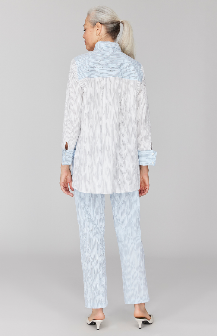 Fabienne is 5' 9" and wearing White in size XS.