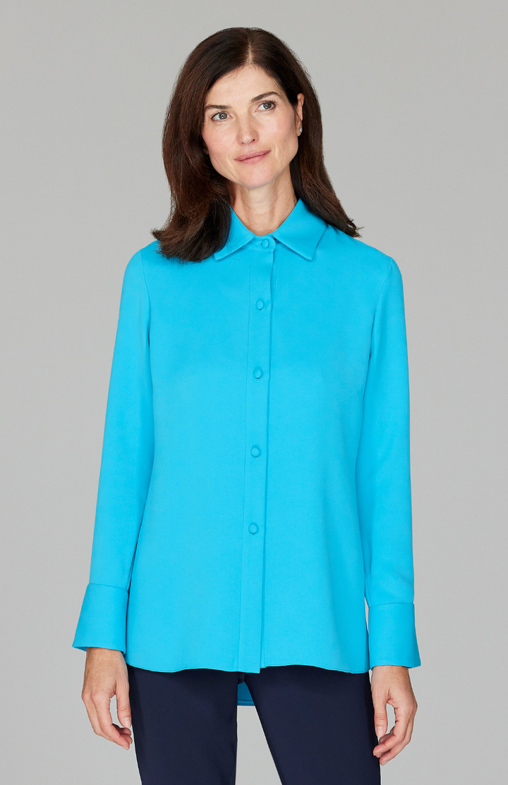 Ekaterina is 5'10" and is wearing a size XS in Turquoise.