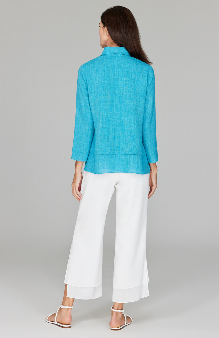 Ekaterina is 5'10" and wearing a size XS in Cyan.