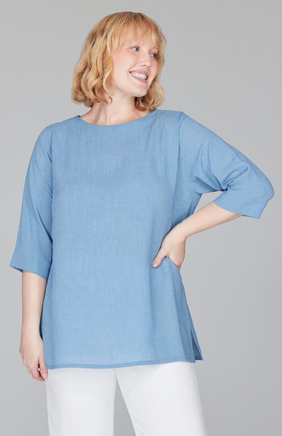 Molly is 5'9" and wearing a size L in Chambray.