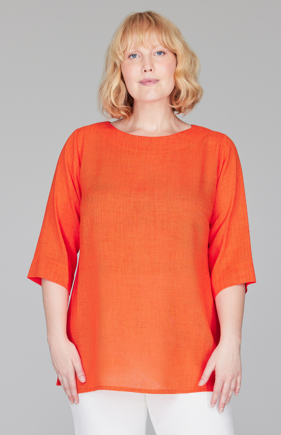 Molly is 5'9" and wearing a size L in Tangerine.