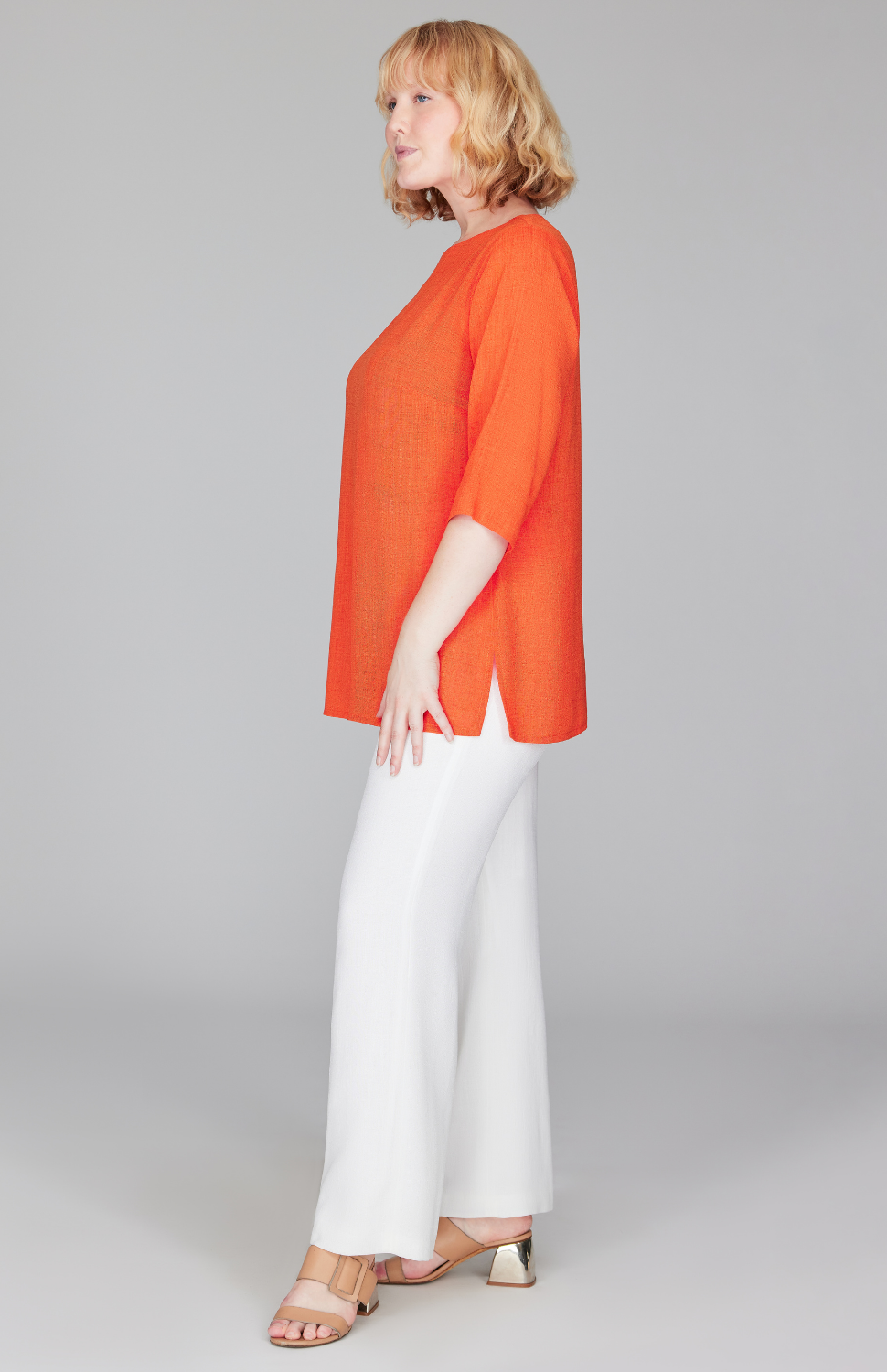 Molly is 5'9" and wearing a size L in Tangerine.