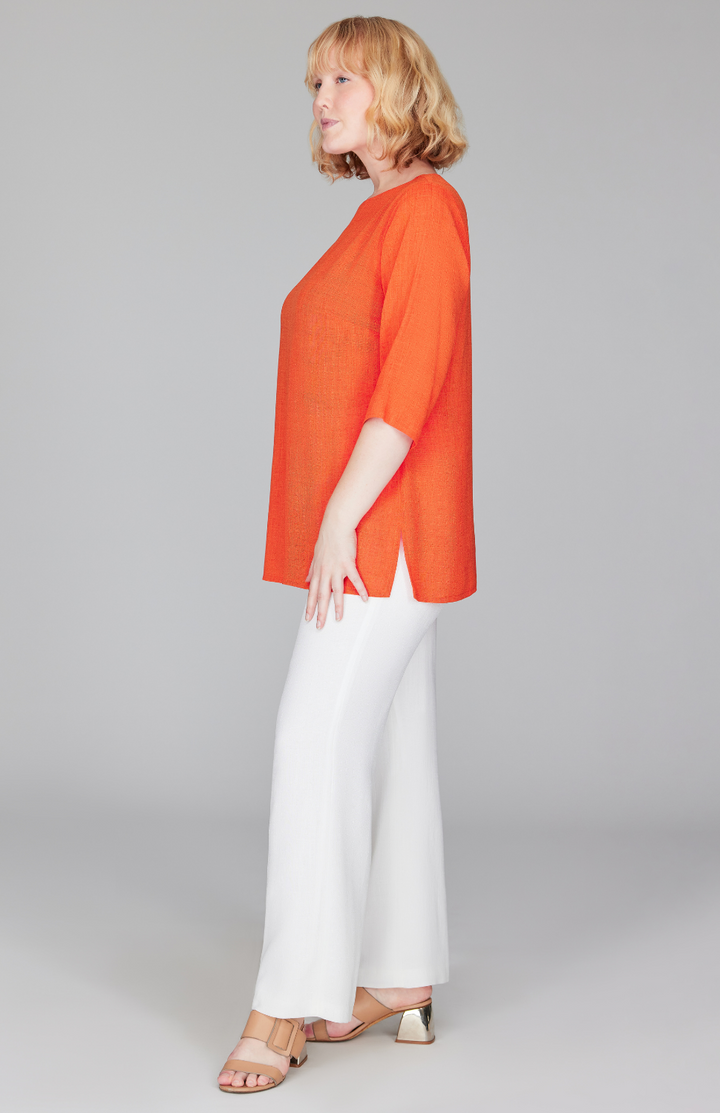 Molly is 5'9" and wearing a size L in Tangerine.