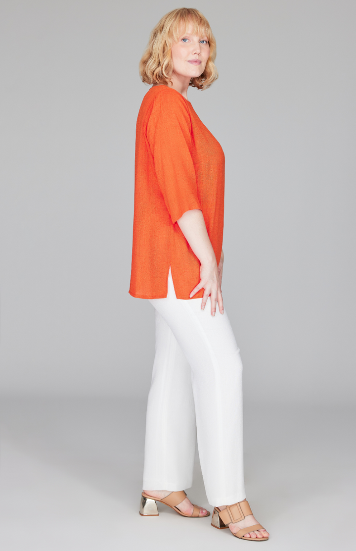 Molly is 5'9" and wearing a size L in Tangerine.