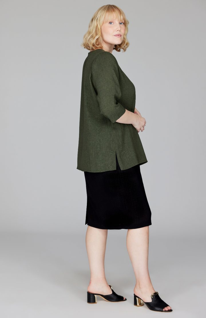 Molly is 5'9" and wearing a size L in Fern.