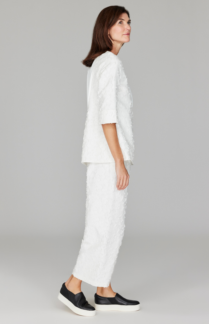 Ekaterina is 5'10" and wearing a size XS in Pearl.