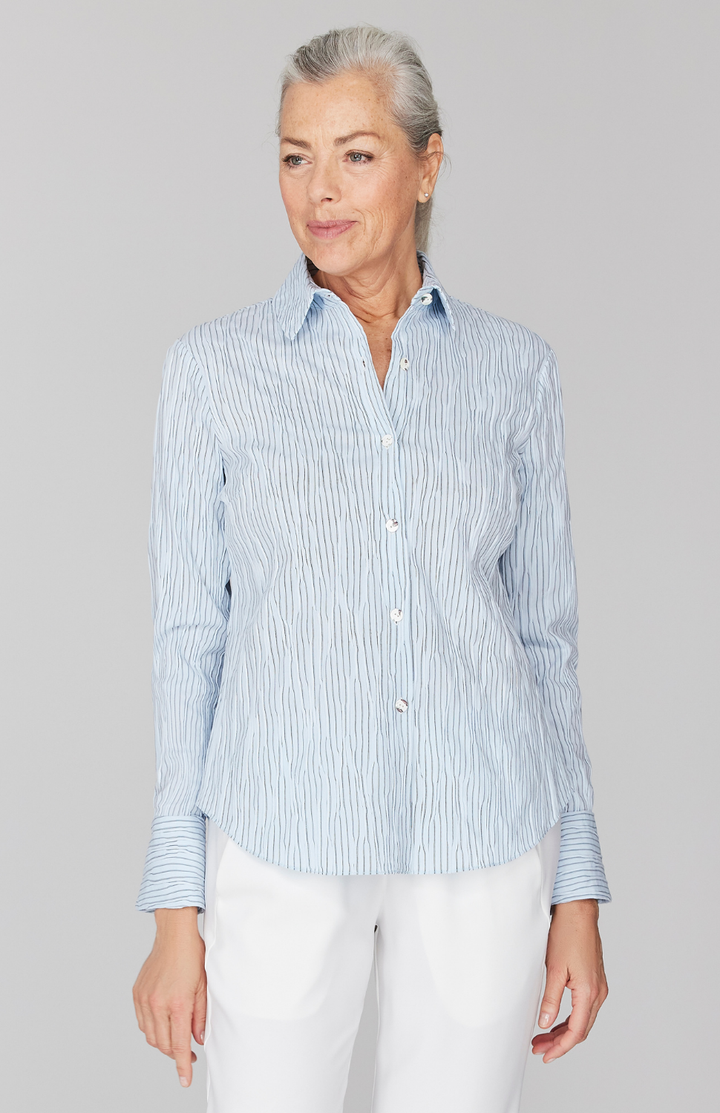 Fabienne is 5' 9" and wearing Blue in size XS.