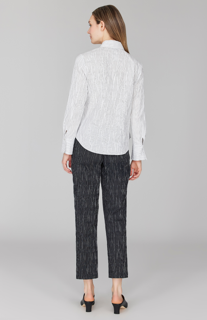 Morgan is 5' 11" and wearing White in size XS.