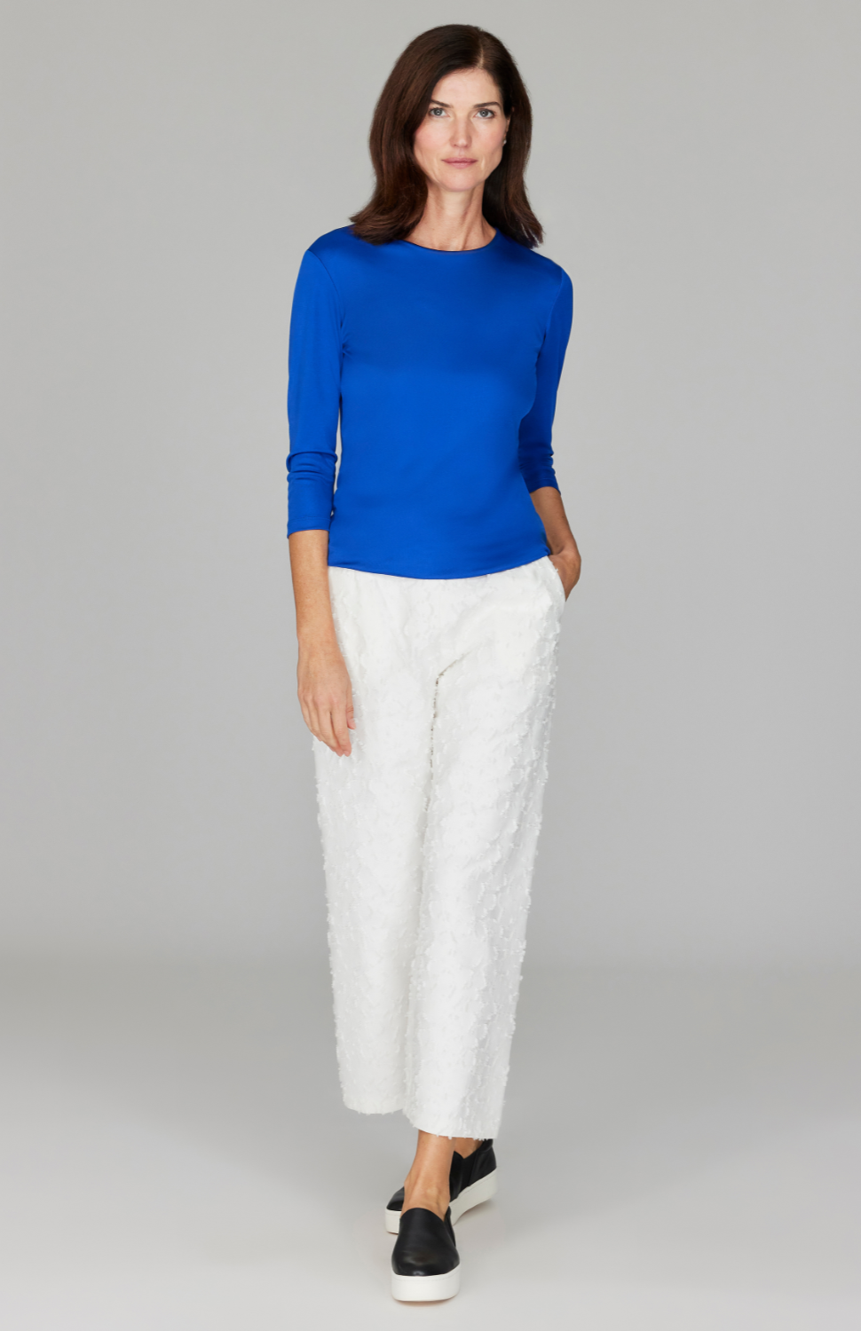 Ekaterina is 5'10" and wearing a size XS in Pearl.