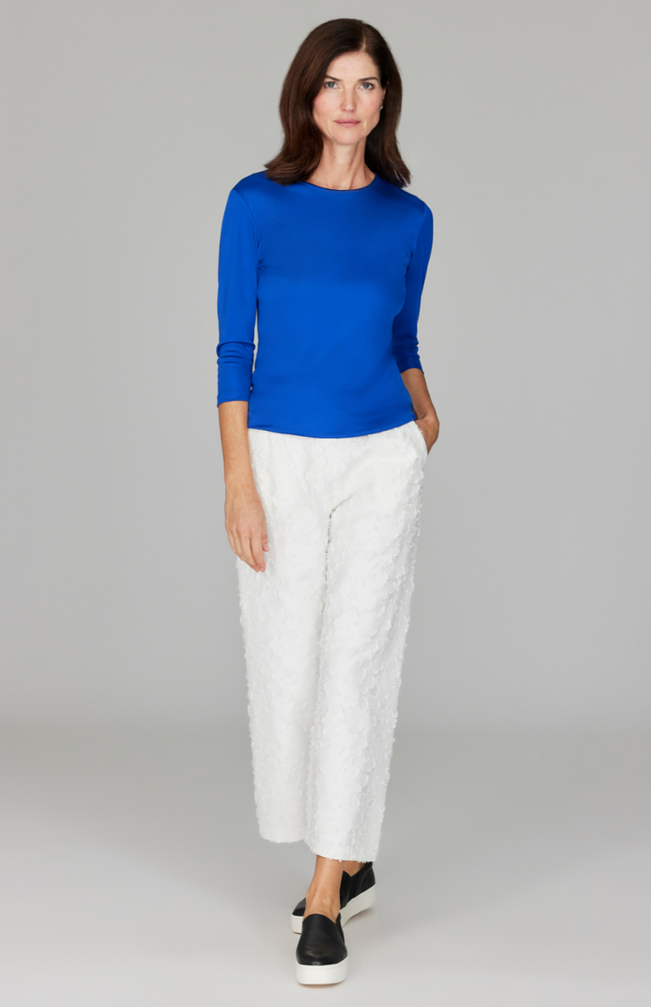 Ekaterina is 5'10" and wearing a size XS in Pearl.