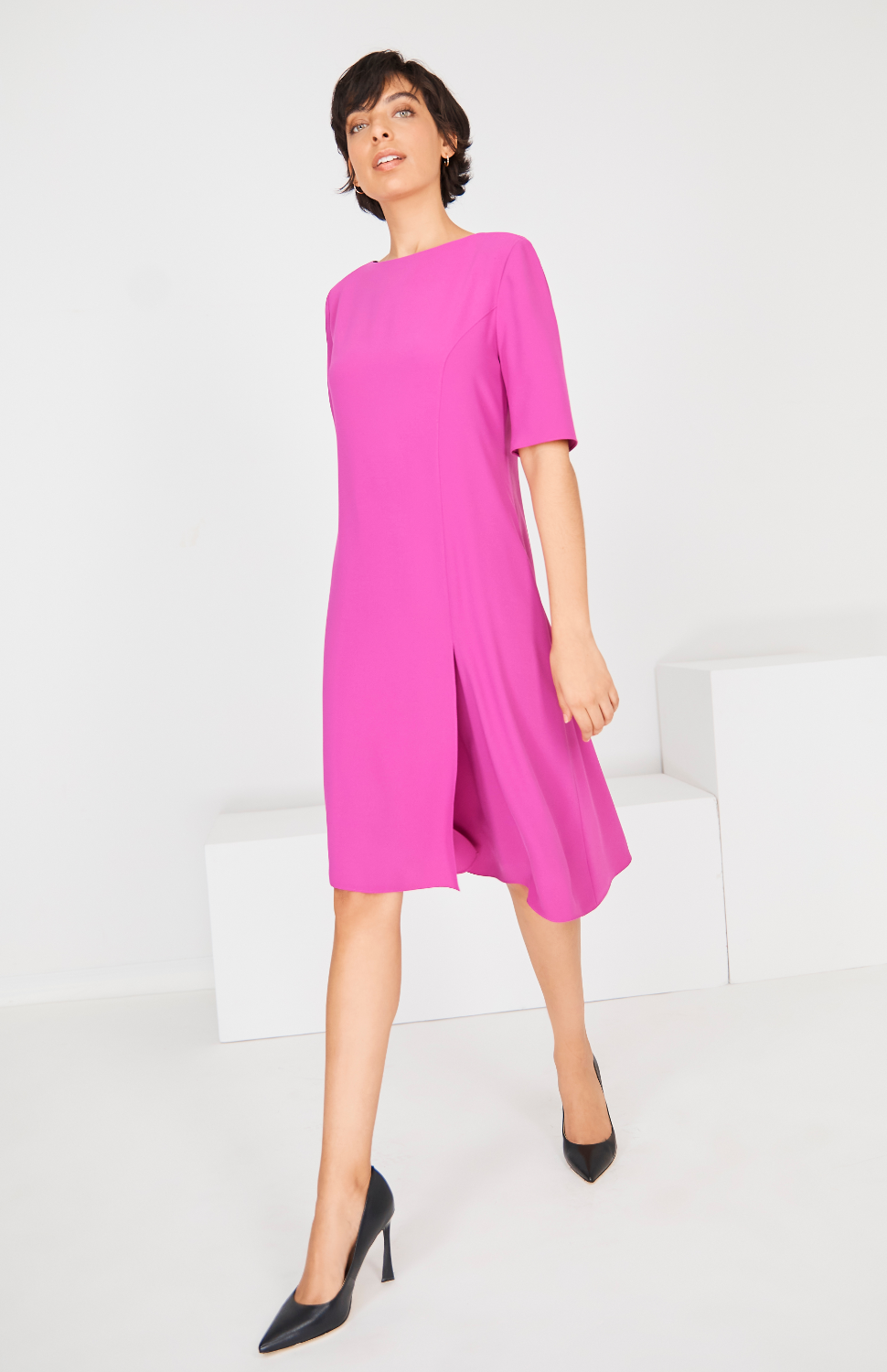 Tiarra is 5'10" and wearing a size XS in Berry.