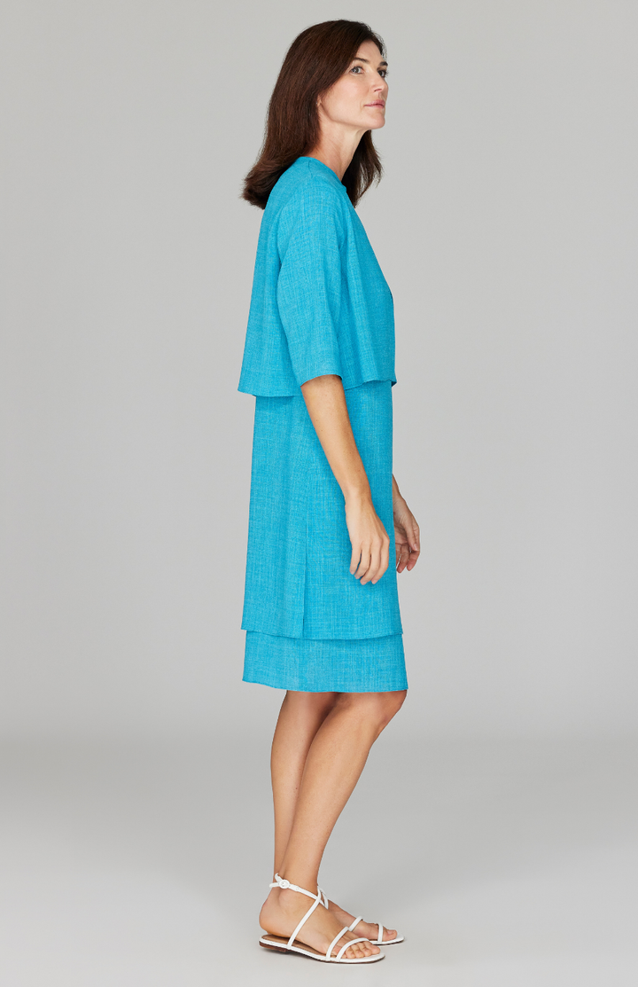 Ekaterina is 5'10" and is wearing a size XS in Cyan.