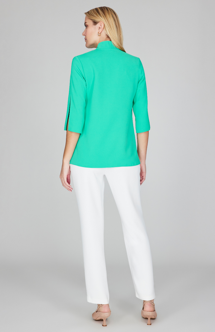 Gabby is 5'10" and wearing Dark Mint in size XS.