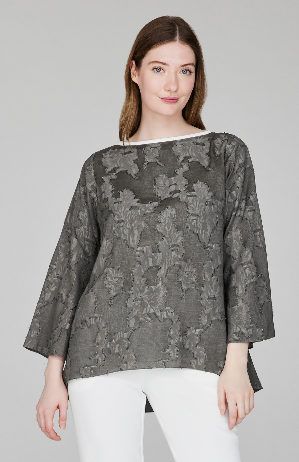 Emmanuelle is 5'9" and wearing Charcoal size XS.