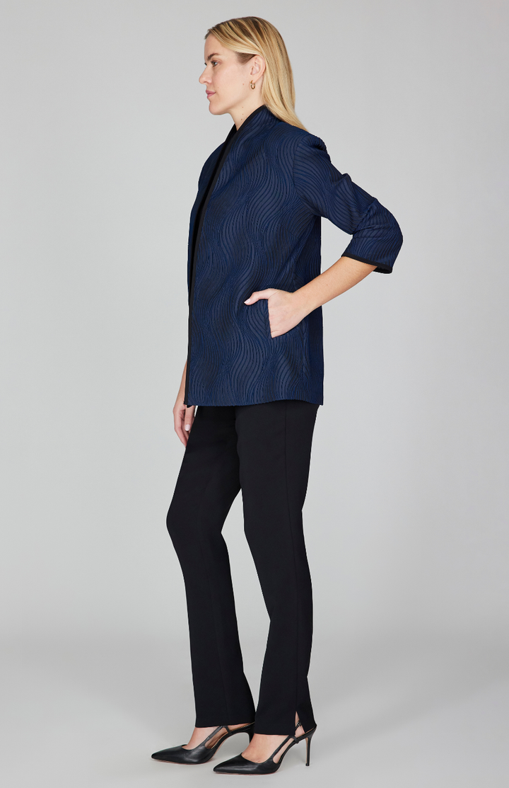 Gabby is 5'10" and wearing Midnight in size XS.