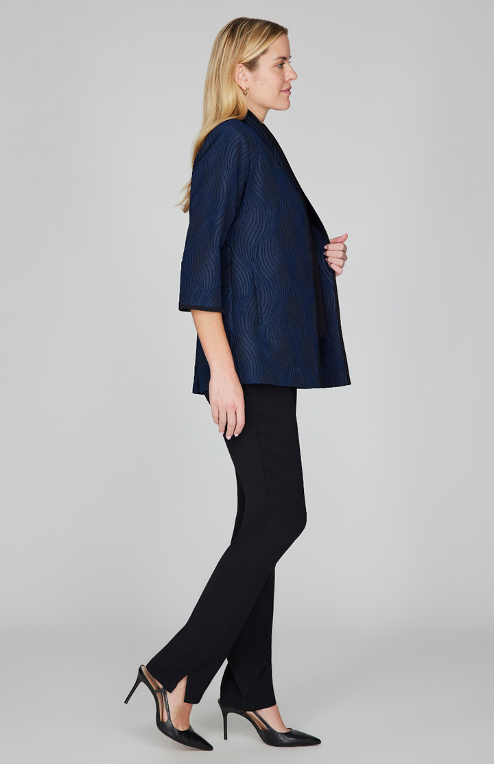 Gabby is 5'10" and wearing Midnight in size XS.