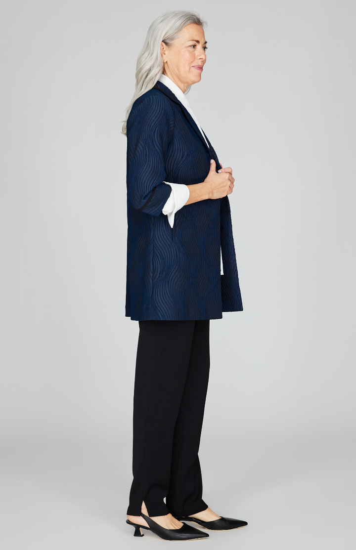 Fabienne is 5'9" and wearing Midnight in size XS.