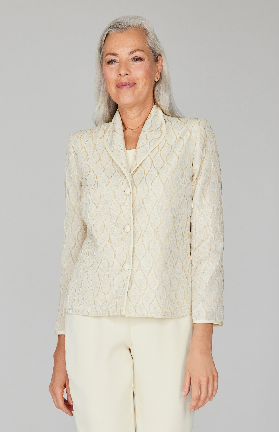 Fabienne is 5'10" and wearing Eggshell size XS.