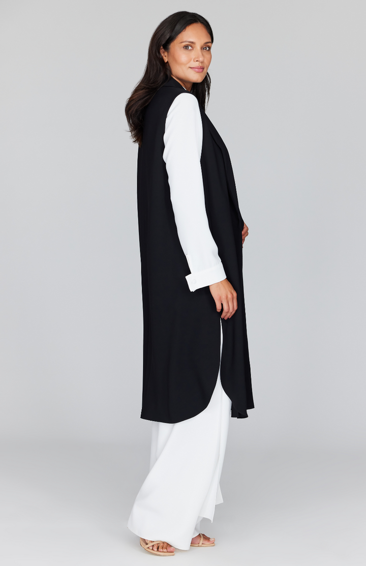 Chelsea is wearing Black in size XS.