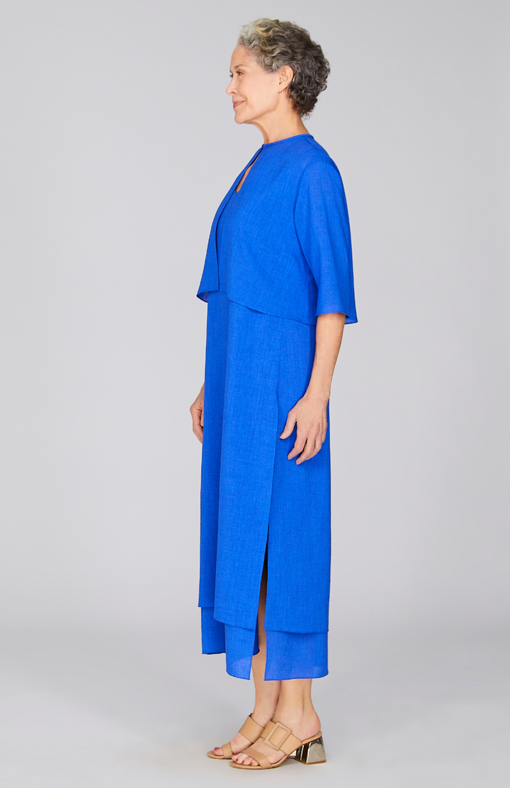Nancy is 5'10" and wearing a size XS in Electric Blue.