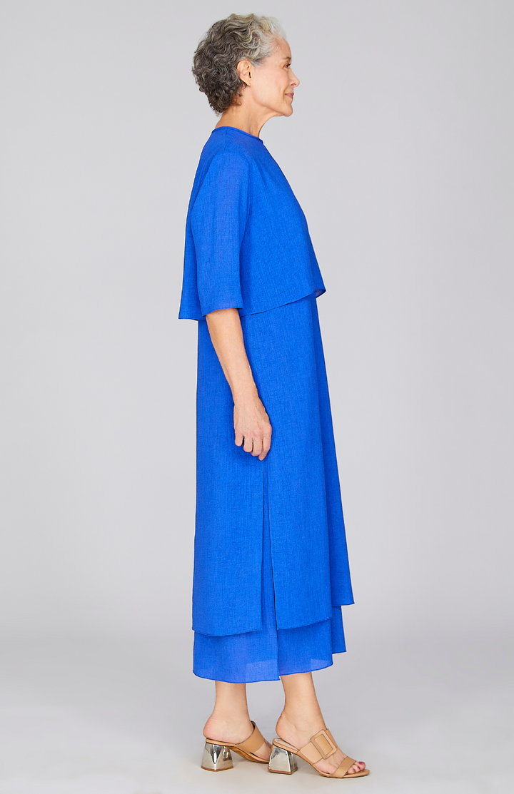 Nancy is 5'10" and wearing a size XS in Electric Blue.