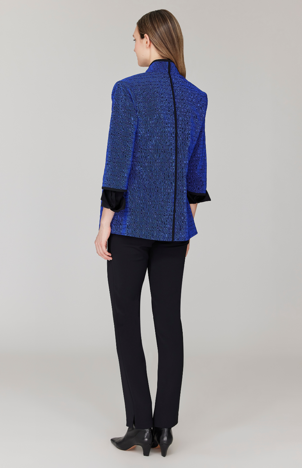 Morgan is 5' 11" and wearing Blue in size XS.