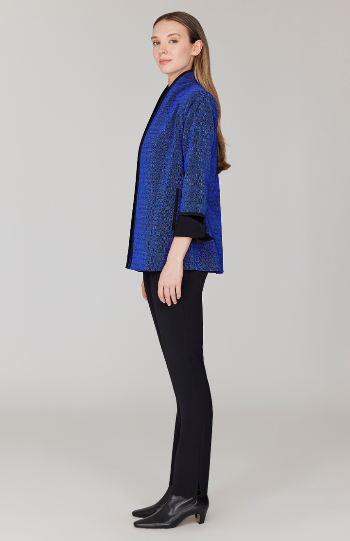 Morgan is 5' 11" and wearing Blue in size XS.