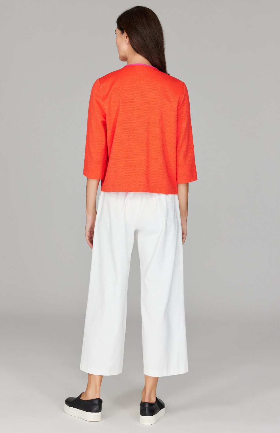 Ekaterina is 5'10" and wearing a size XS in Orange.