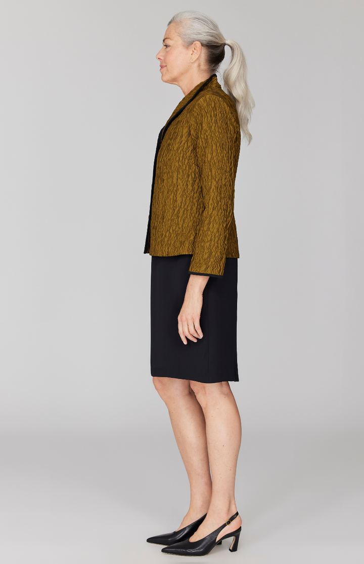 Fabienne is 5' 9" and wearing Gold in size XS.