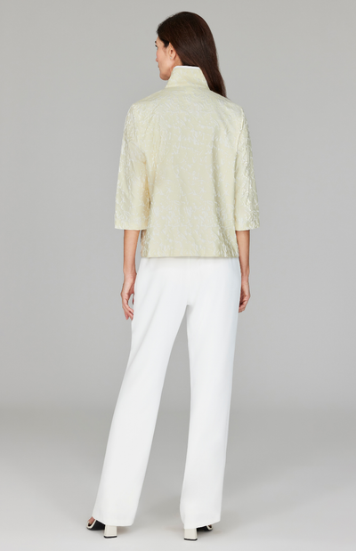 Ekaterina is 5'10" and wearing a size XS in Butter.
