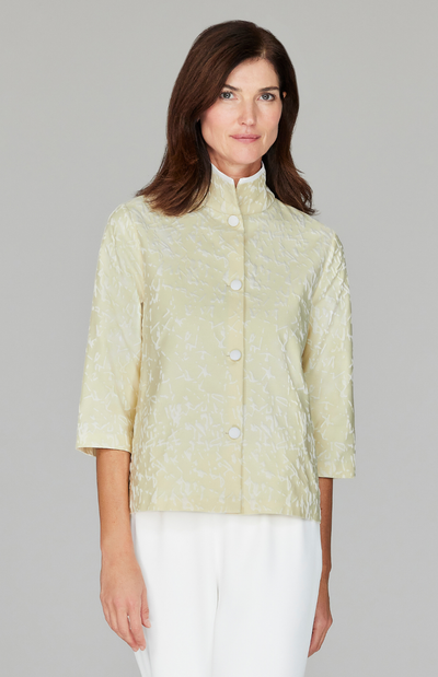 Ekaterina is 5'10" and wearing a size XS in Butter.