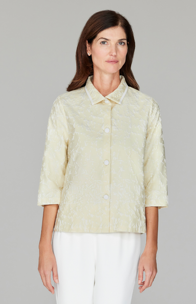 Ekaterina is 5'10" and wearing a size XS in Butter.