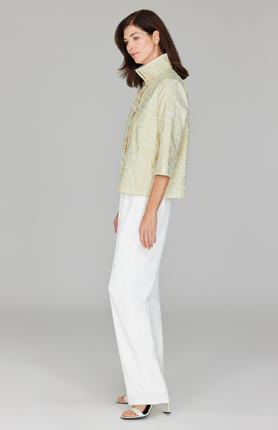 Ekaterina is 5'10" and wearing a size XS in Butter.