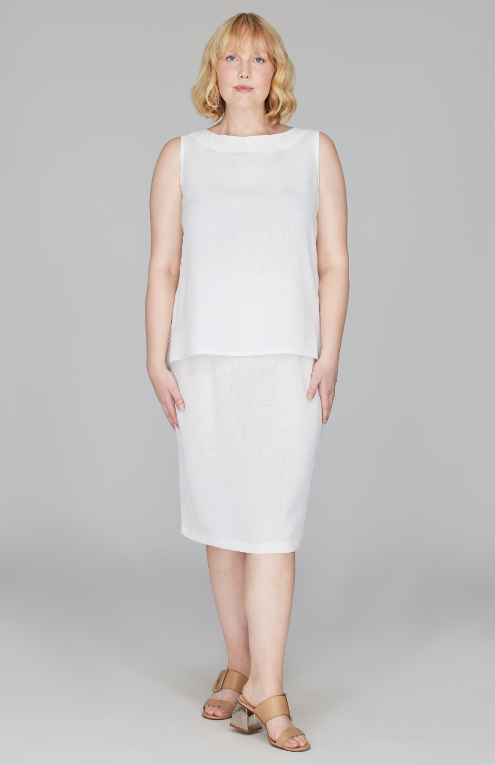 Molly is 5'9" and wearing a size L in White.