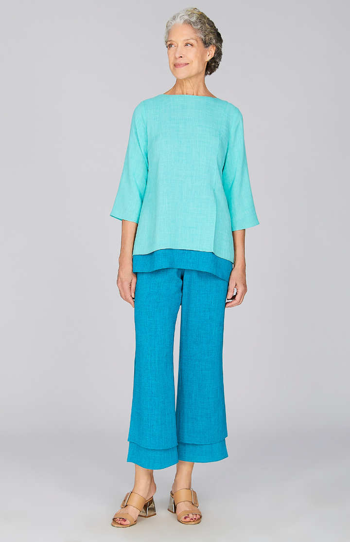 Nancy is 5'10" and wearing a size XS in Turquoise.