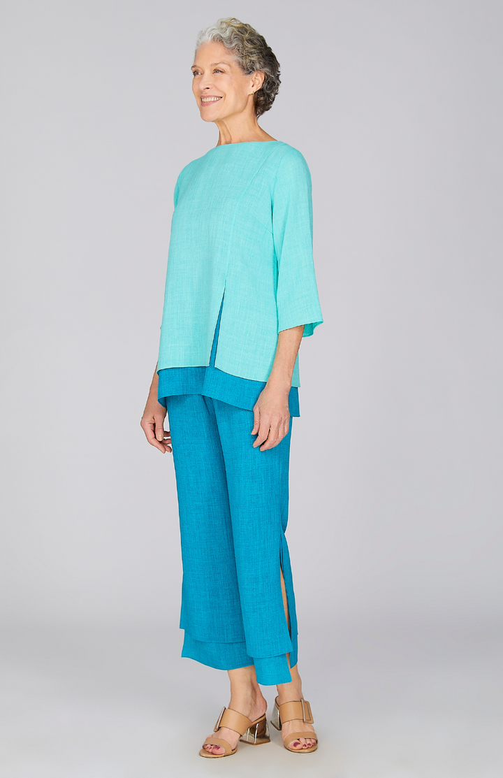 Nancy is 5'10" and wearing a size XS in Turquoise.
