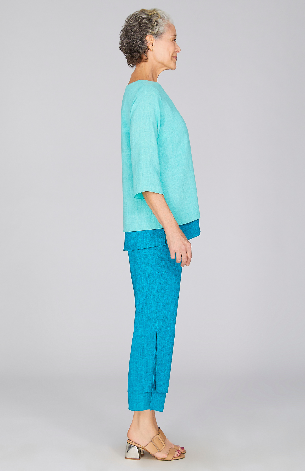 Nancy is 5'10" and wearing a size XS in Turquoise.