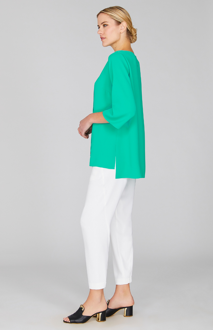 Gabby is 5'10" and wearing a size XS in Dark Mint.