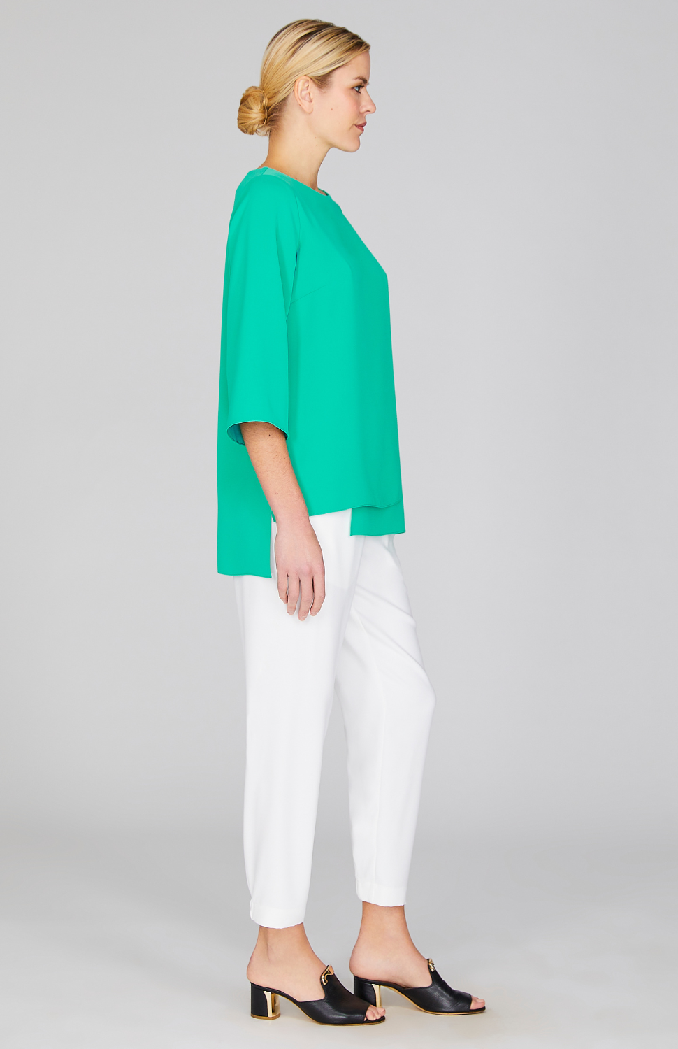 Gabby is 5'10" and wearing a size XS in Dark Mint.