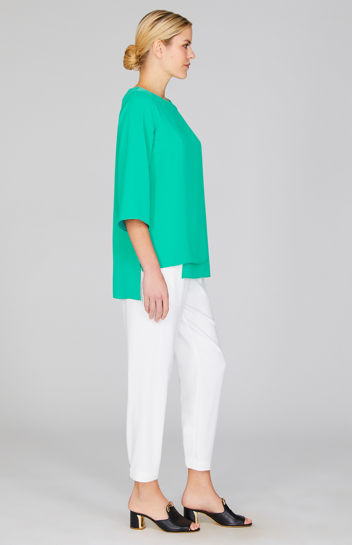 Gabby is 5'10" and wearing a size XS in Dark Mint.