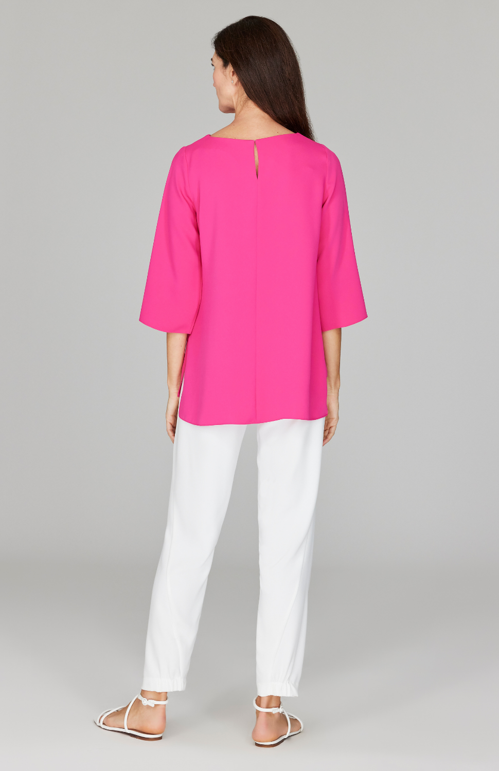 Ekaterina is 5'10" and is wearing a size XS in Pink.