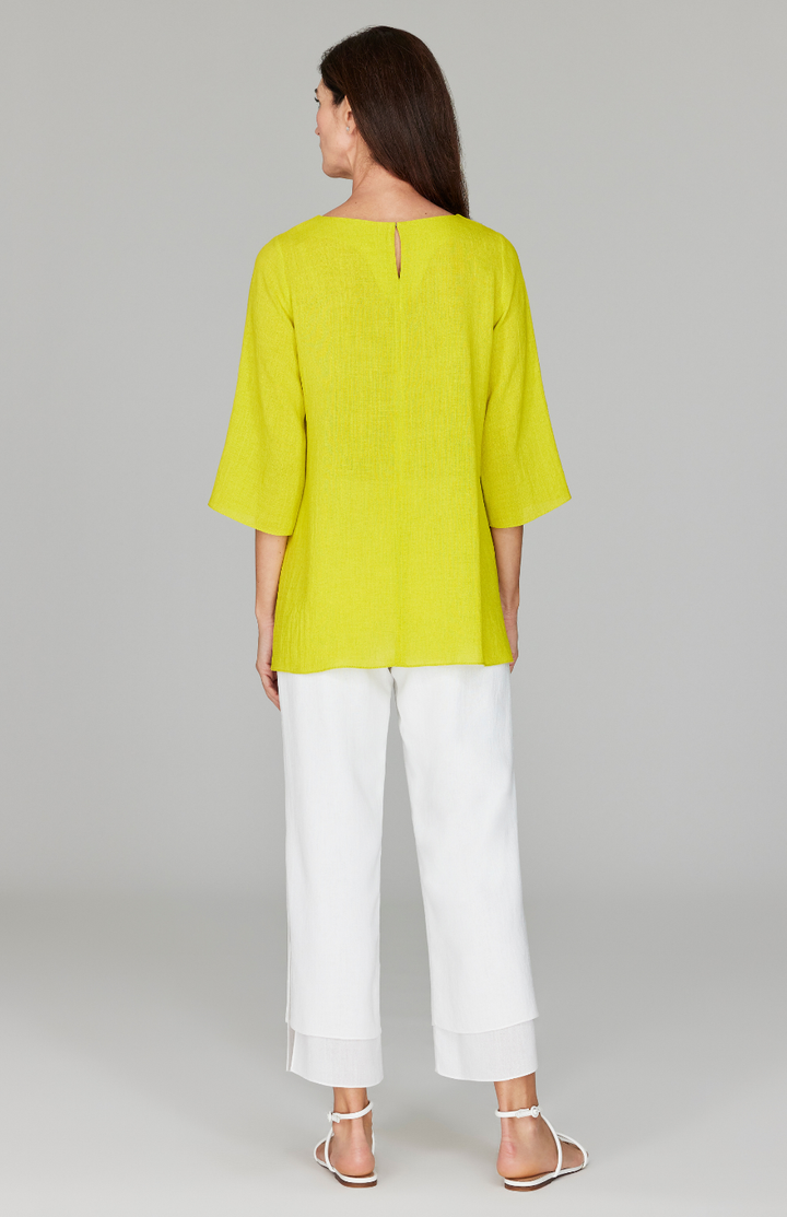 Ekaterina is 5'10" and is wearing a size XS in Citrus.