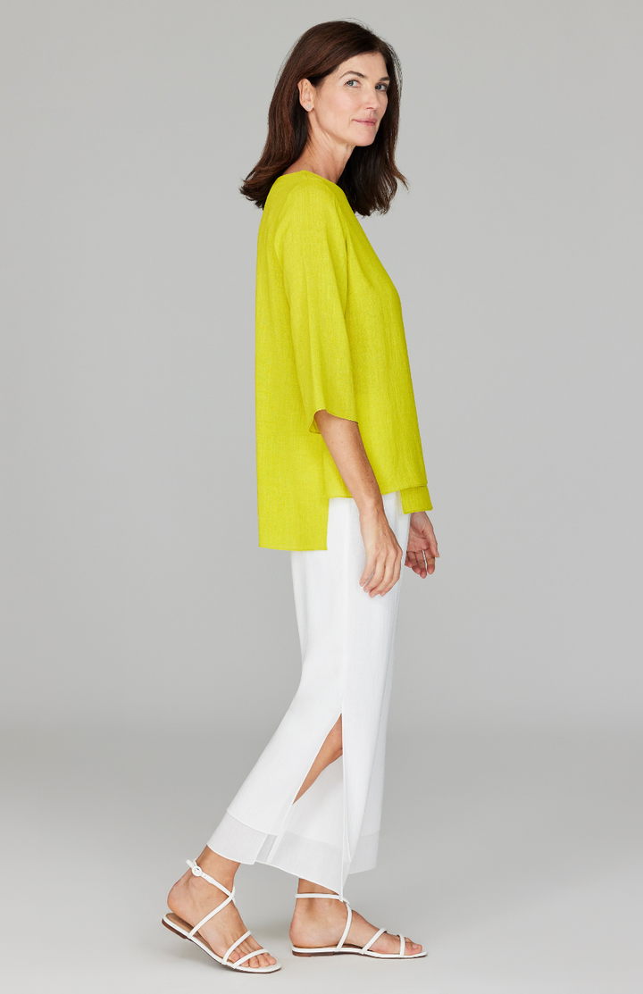 Ekaterina is 5'10" and is wearing a size XS in Citrus.