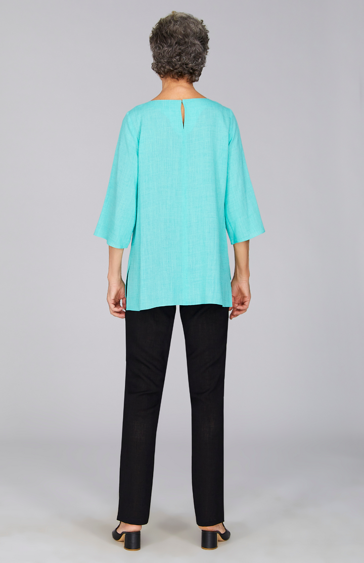Nancy is 5'10" and wearing a size XS in Jade.