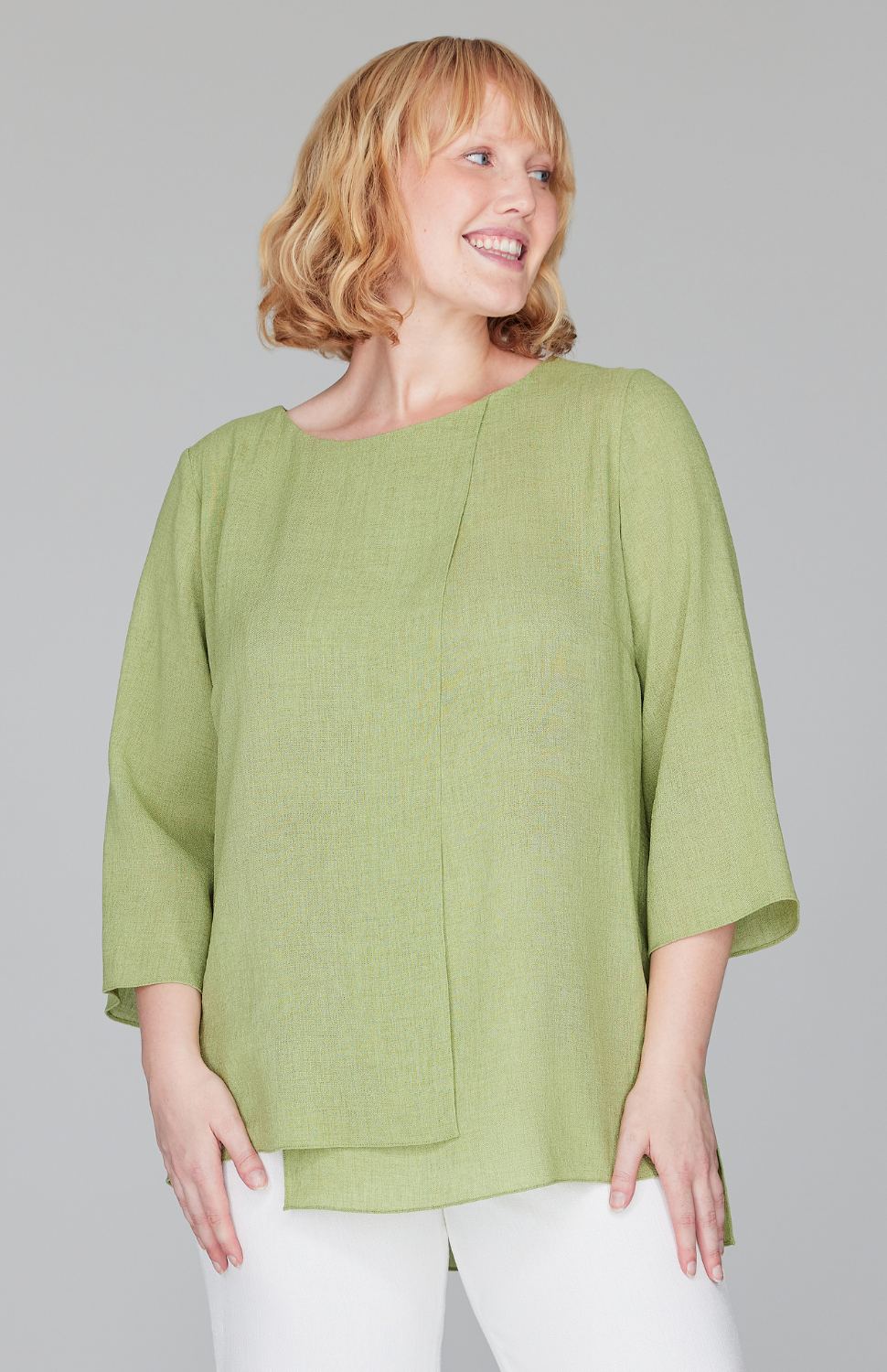 Molly is 5'9" and wearing a size L in Kiwi.