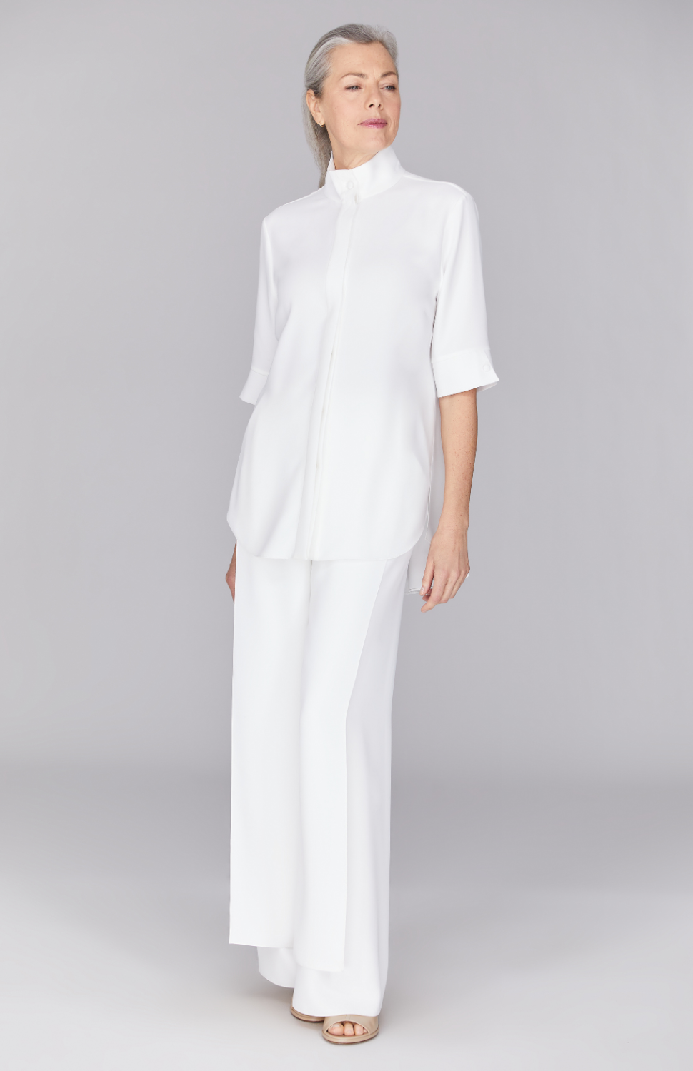 Fabienne is 5’ 9" and wearing Pearl in XS.