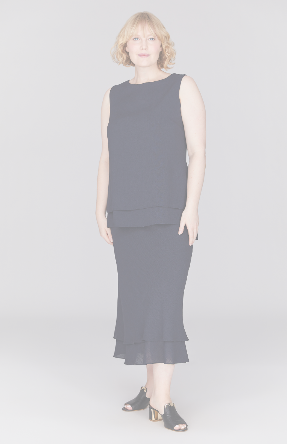 Molly is 5' 8.5" wearing Midnight in M.