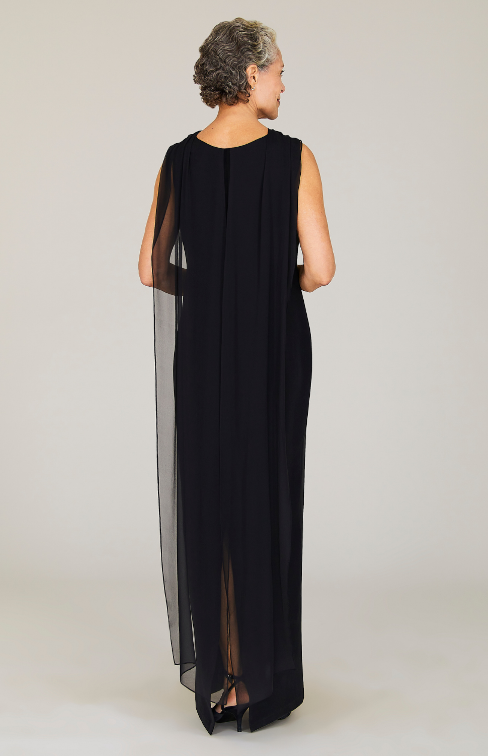 Nancy is wearing Black in size XS.